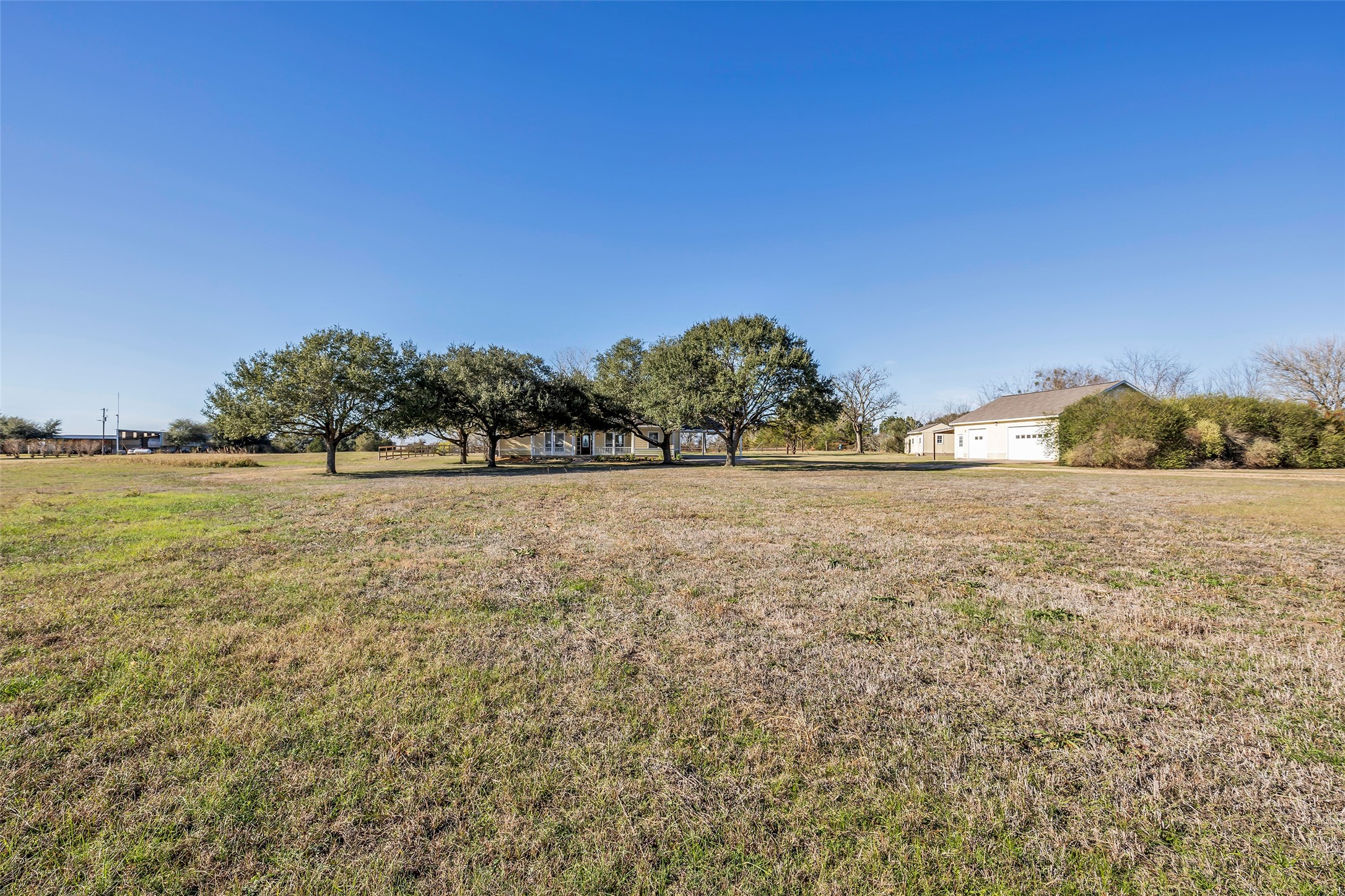 1075 Harrisburg Road Brenham, TX 77833 - Photo 2 of 49 a view of a field with an ocean view