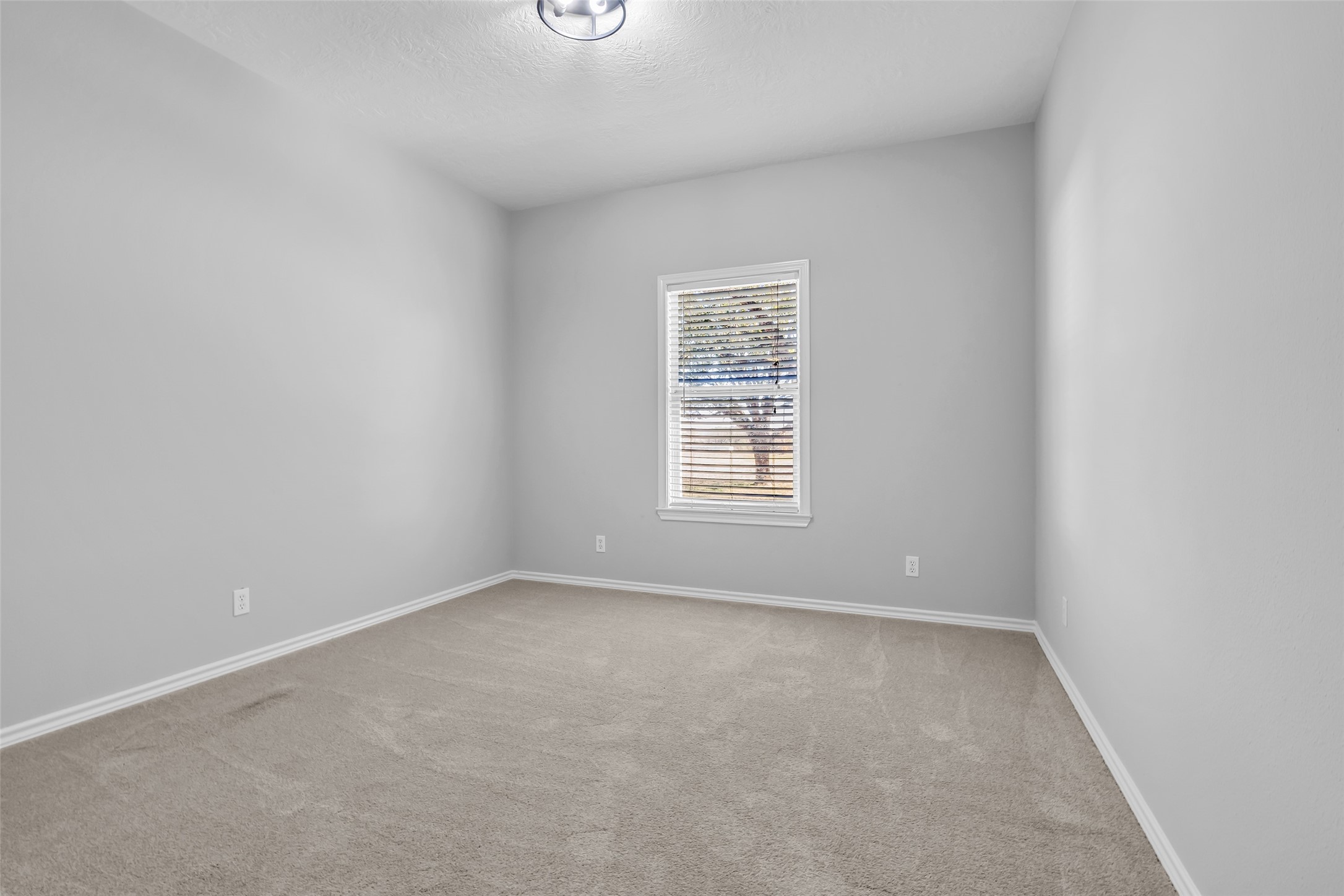 1075 Harrisburg Road Brenham, TX 77833 - Photo 29 of 49 an empty room with windows