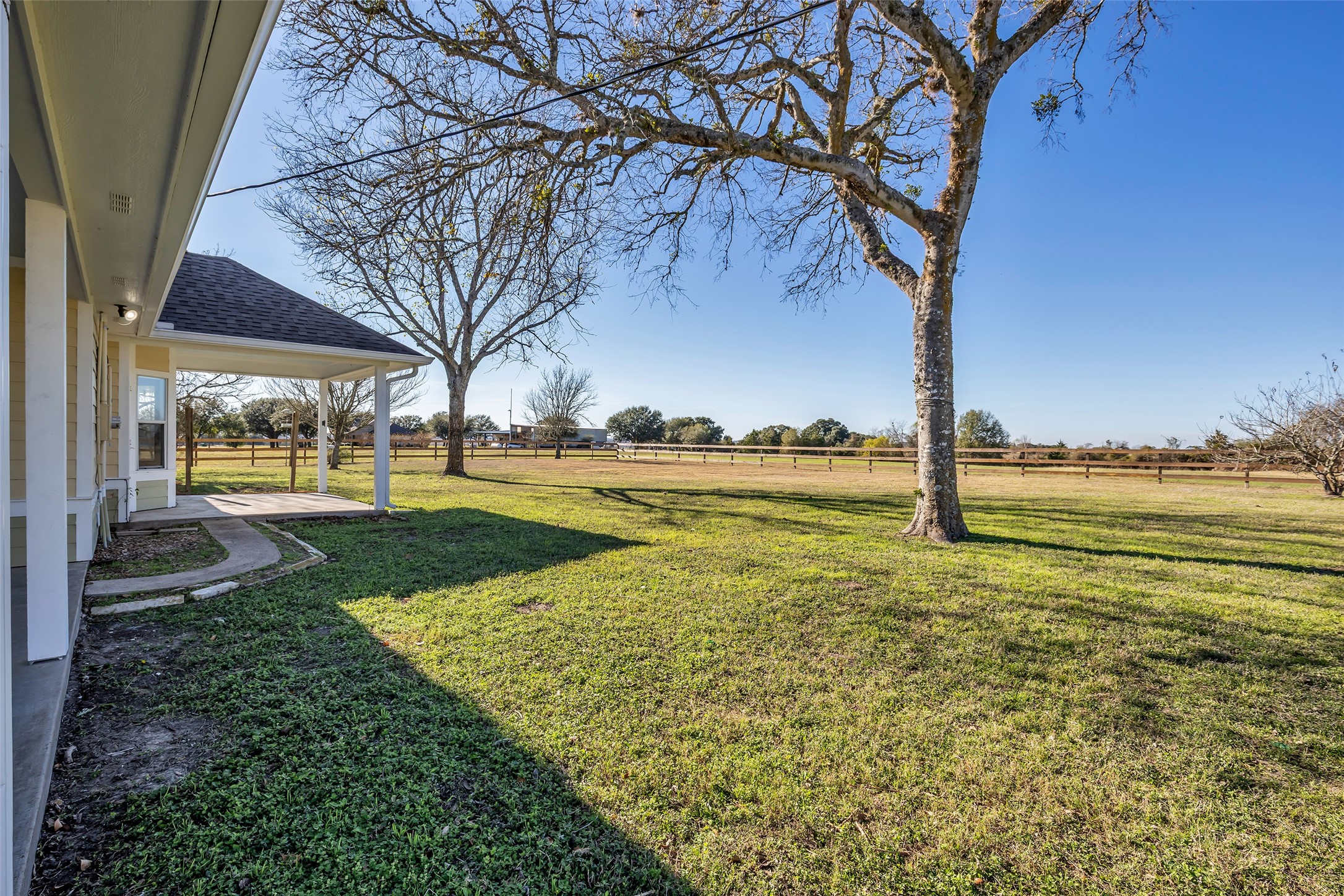 1075 Harrisburg Road Brenham, TX 77833 - Photo 31 of 49 a view of a yard with an outdoor space