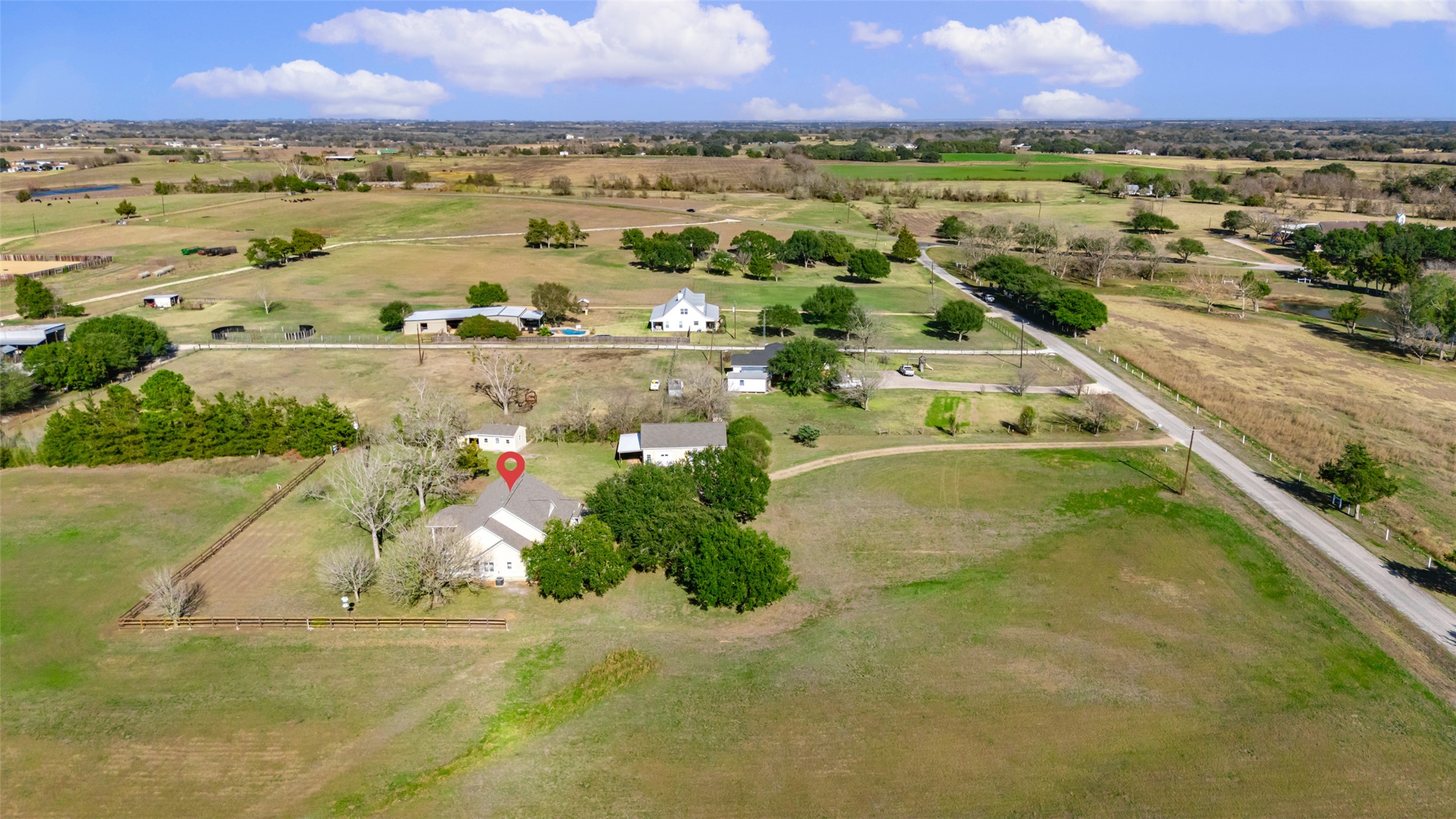 1075 Harrisburg Road Brenham, TX 77833 - Photo 48 of 49 an aerial view of ocean with residential houses with outdoor space and swimming pool