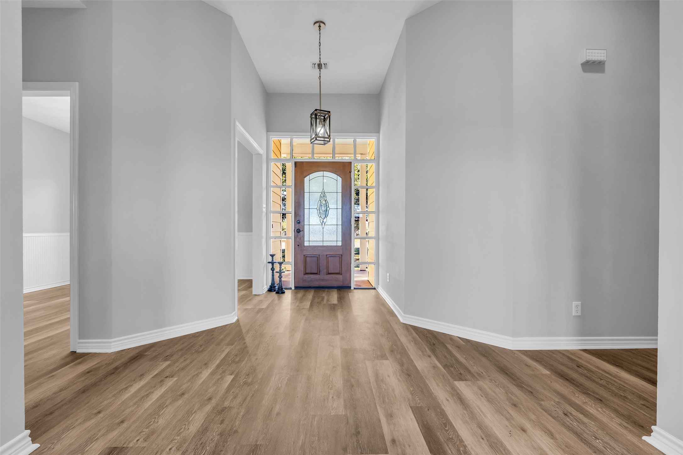 1075 Harrisburg Road Brenham, TX 77833 - Photo 7 of 49 wooden floor in an empty room with a window