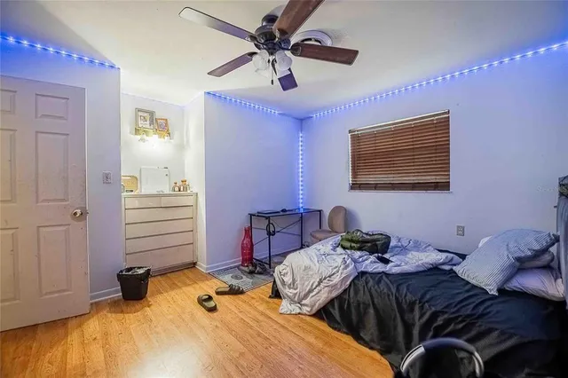 a bathroom with a sink mirror and toilet