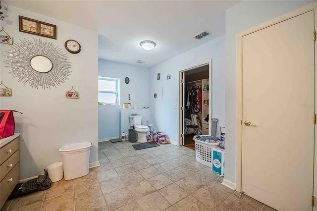 a view of a livingroom with furniture and wooden floor