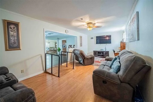 a room that has a bed and a night stand in it