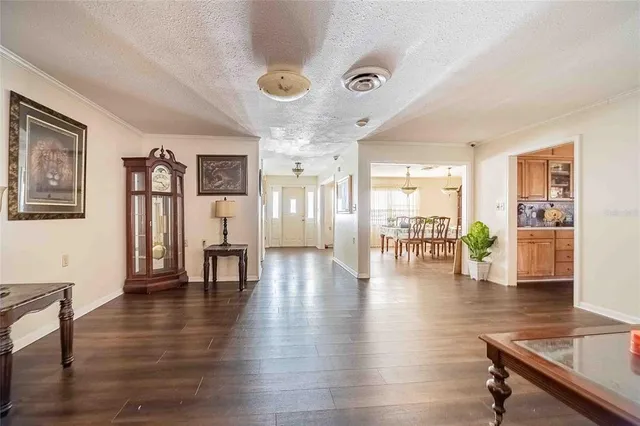 an aerial view of house with yard