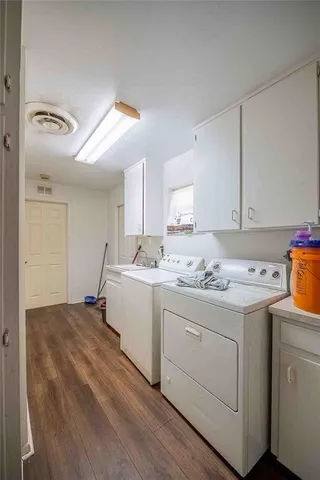 a swimming pool with outdoor seating and yard