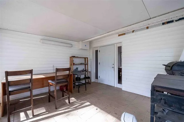 a kitchen with stainless steel appliances a stove a sink and a microwave