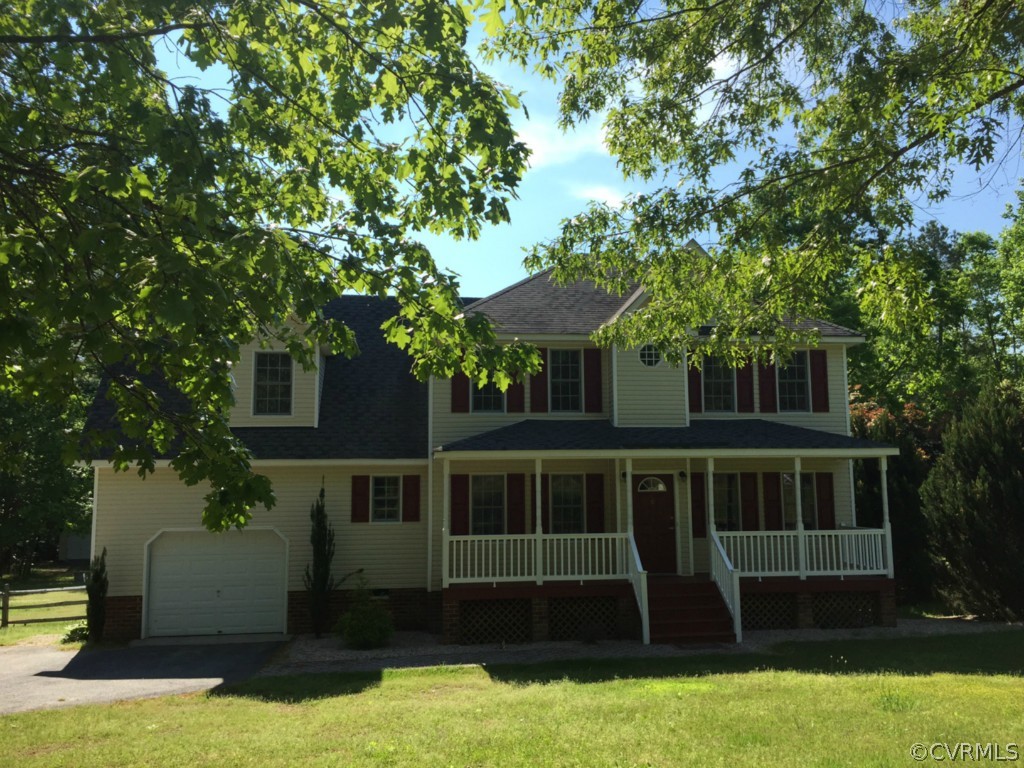 17941 Loving Union Road Disputanta, VA 23842 - Photo 1 of 17 a front view of a house with a yard
