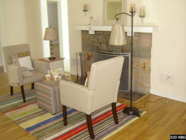 2390 Watt Street Reno, NV 89509 - Photo 5 of 9 a living room with furniture and a table