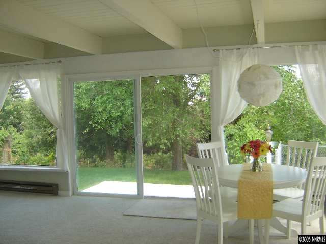 2390 Watt Street Reno, NV 89509 - Photo 8 of 9 a view of a dining room with furniture window and outside view