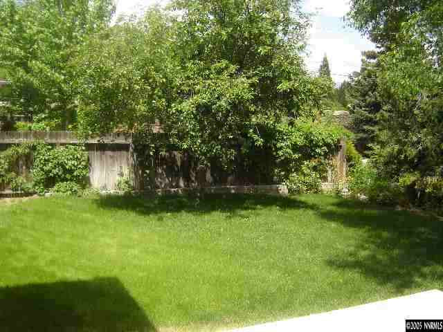 2390 Watt Street Reno, NV 89509 - Photo 9 of 9 a view of a backyard with large trees