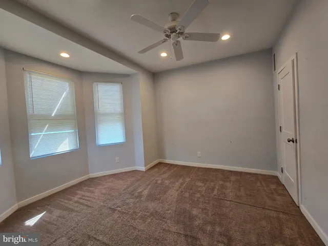 a view of a room with rack on the wall