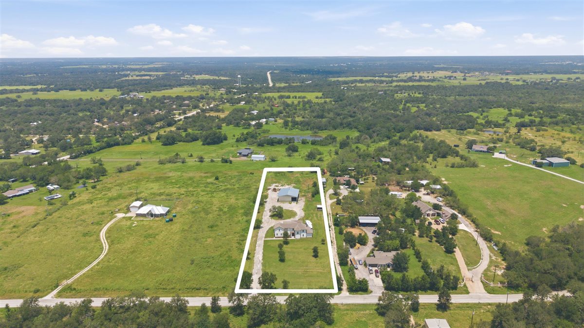 1206 Walter Hoffman Road Cedar Creek, TX 78612 - Photo 40 of 40 Aerial view showing property boundaries. Large spacious front yard with and approximately an additional acre located behind the metal building.