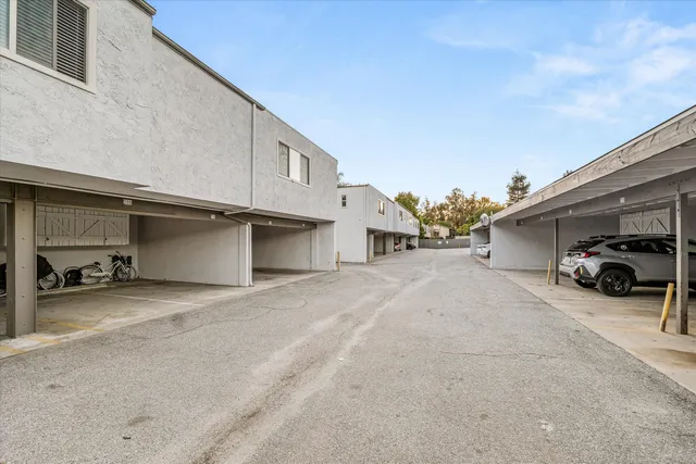 a view of garage and a car parked in it