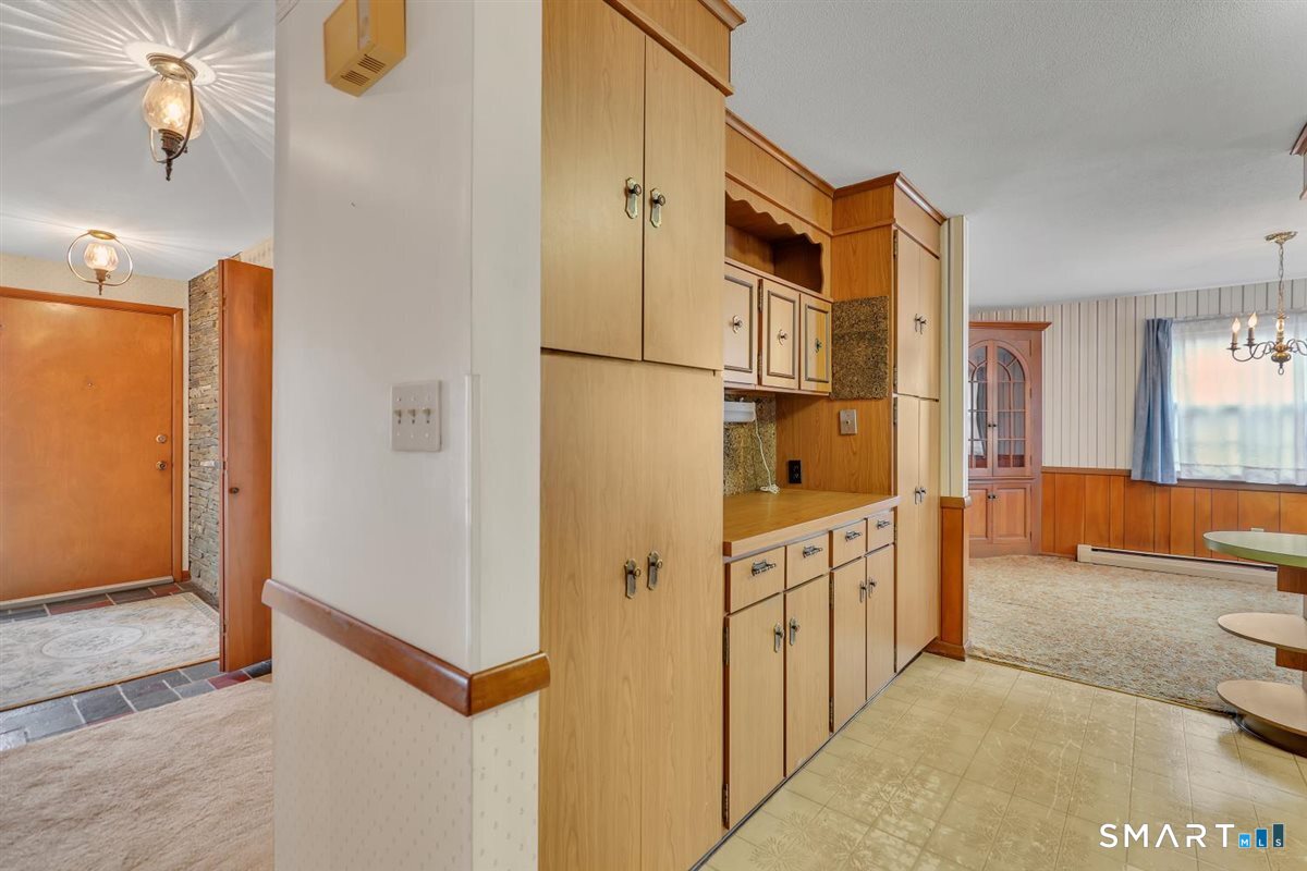 282 Parker Avenue Meriden, CT 06450 - Photo 6 of 27 a kitchen with stainless steel appliances granite countertop a refrigerator and a sink