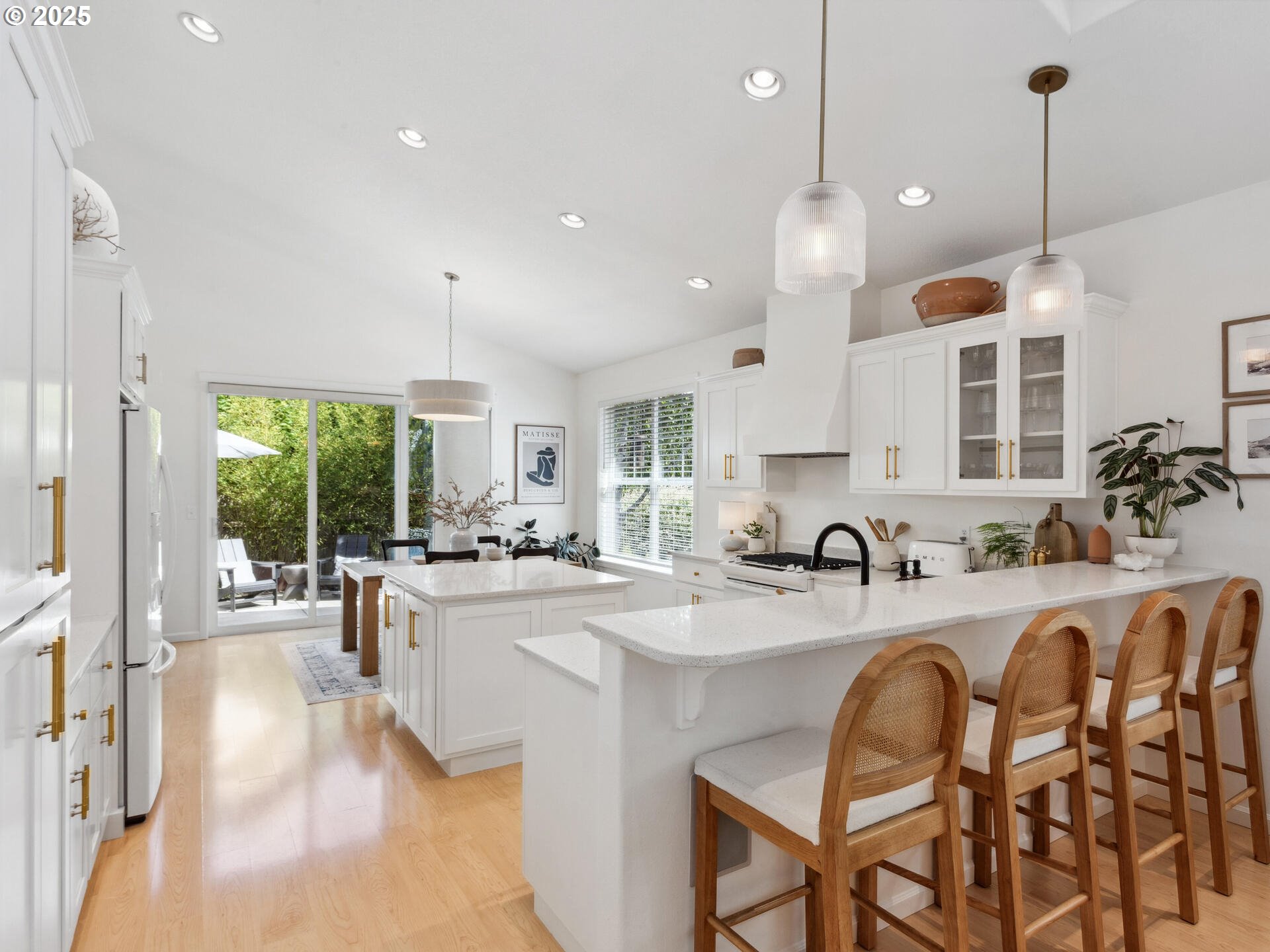 2318 South Sauk Way Ridgefield, WA 98642 - Photo 12 of 47 a kitchen with sink table and chairs