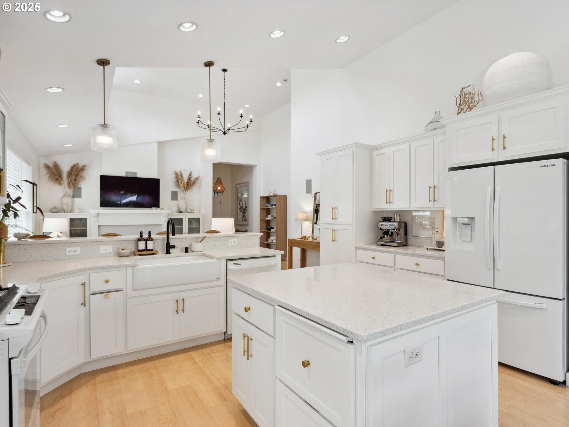 2318 South Sauk Way Ridgefield, WA 98642 - Photo 17 of 47 a kitchen that has a lot of white cabinets and stainless steel appliances