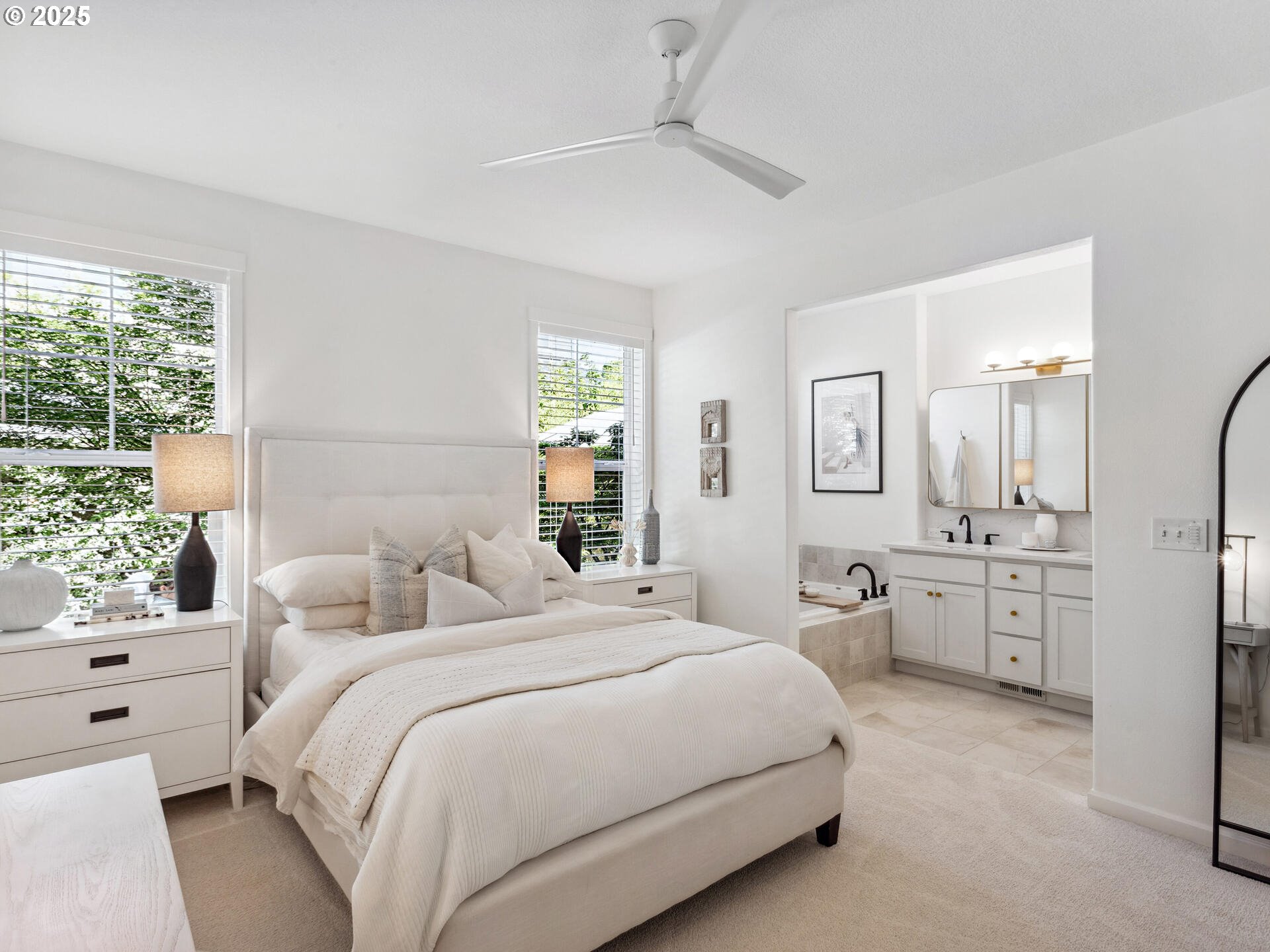 2318 South Sauk Way Ridgefield, WA 98642 - Photo 26 of 47 a spacious bedroom with a large bed and a window