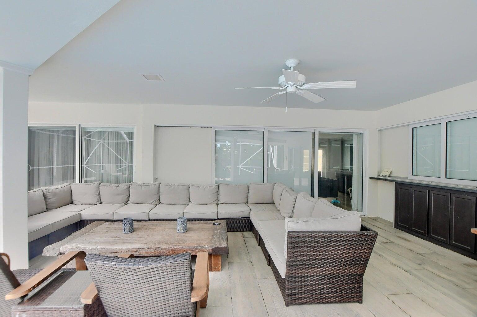 880 Hickory Terrace Boca Raton, FL 33486 - Photo 28 of 38 a living room with furniture and wooden floor