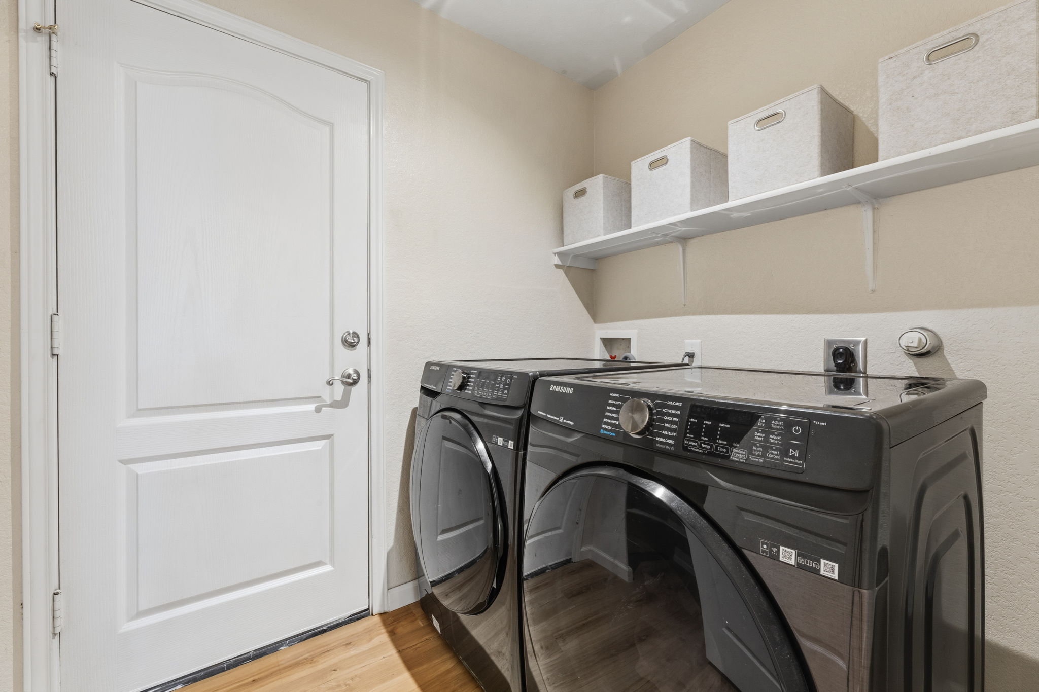 310 Myrtle Street Kyle, TX 78640 - Photo 12 of 39 a utility room with dryer and washer