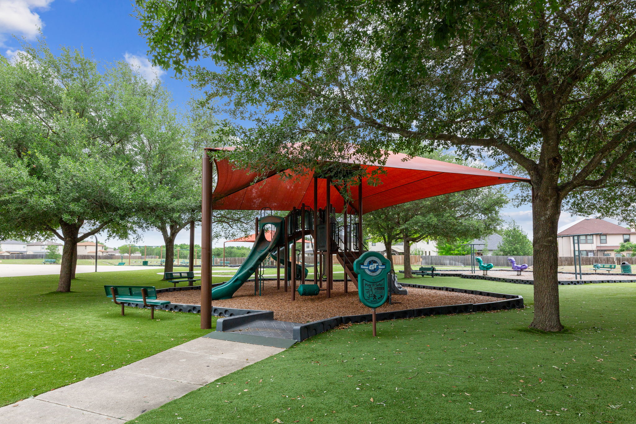 310 Myrtle Street Kyle, TX 78640 - Photo 34 of 39 a view of a park with slide