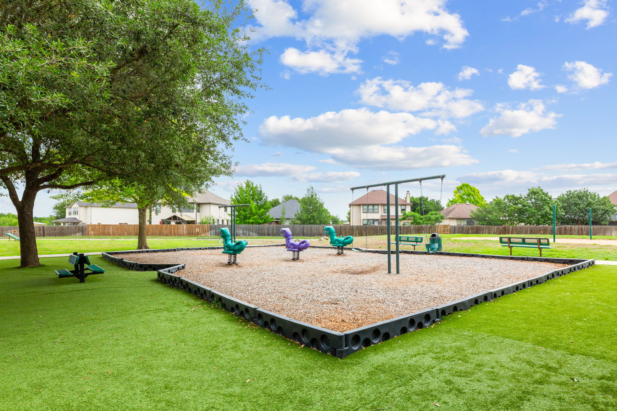 310 Myrtle Street Kyle, TX 78640 - Photo 37 of 39 a park view with a sitting space