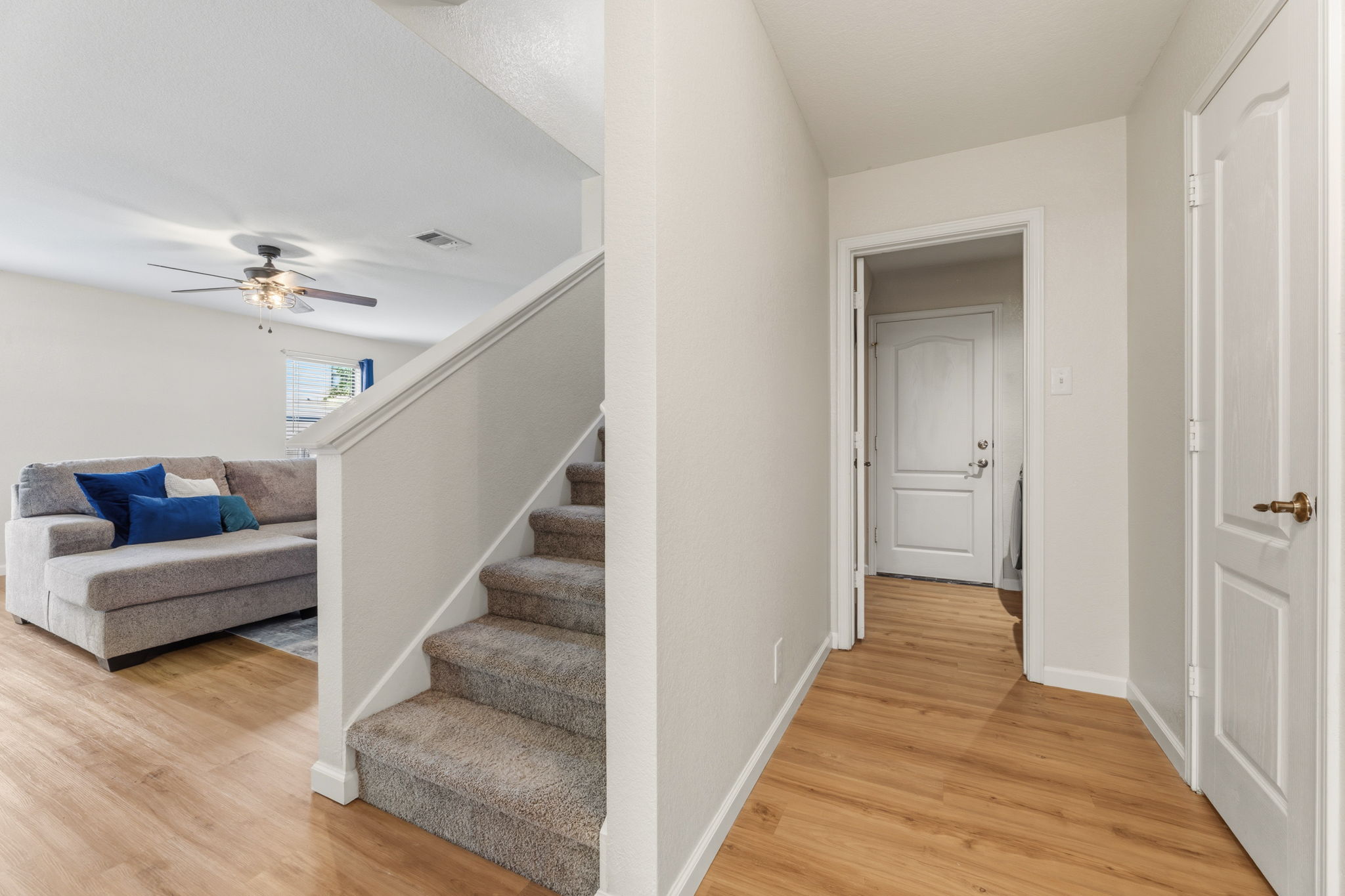 310 Myrtle Street Kyle, TX 78640 - Photo 9 of 39 a view of entryway and hall with wooden floor