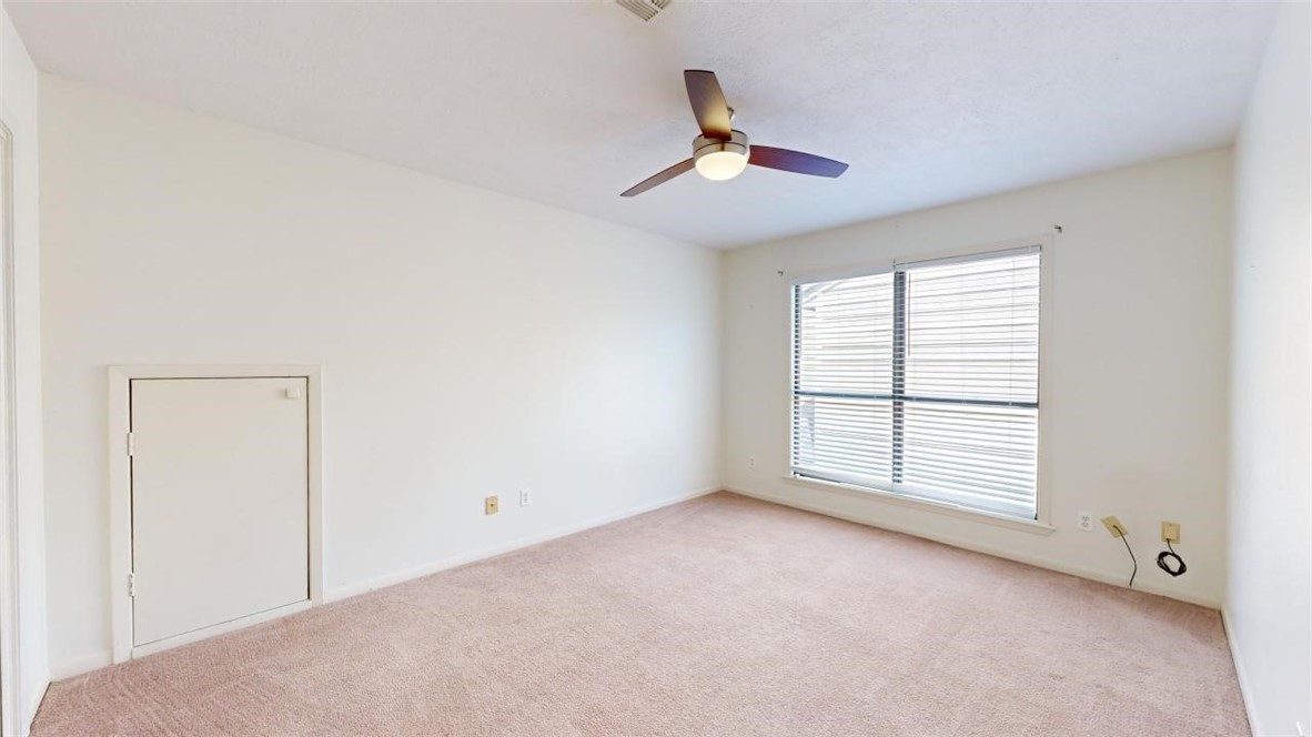 3004 Gleneagles Court Bryan, TX 77802 - Photo 22 of 38 a view of an empty room with a window