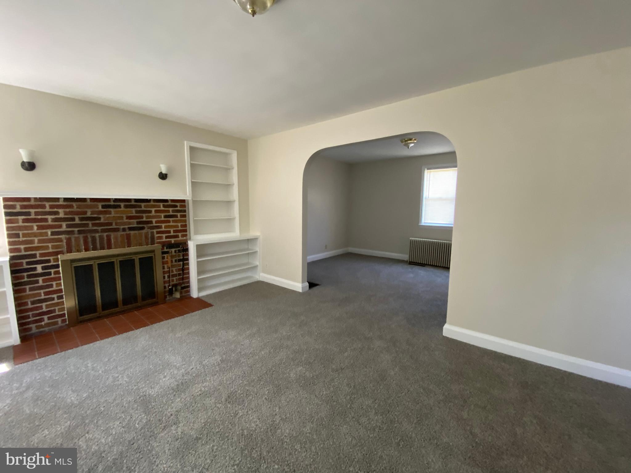 9532 Belair Road Baltimore, MD 21236 - Photo 11 of 20 a view of a livingroom with a fireplace