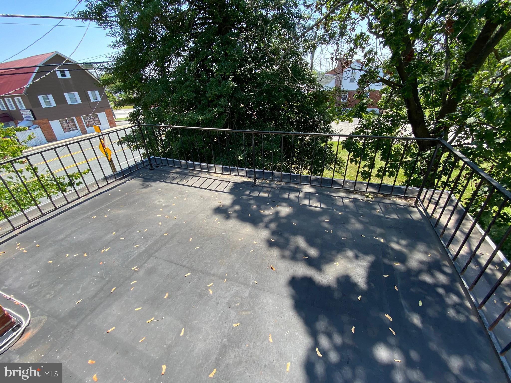9532 Belair Road Baltimore, MD 21236 - Photo 16 of 20 a backyard of a house with lots of green space