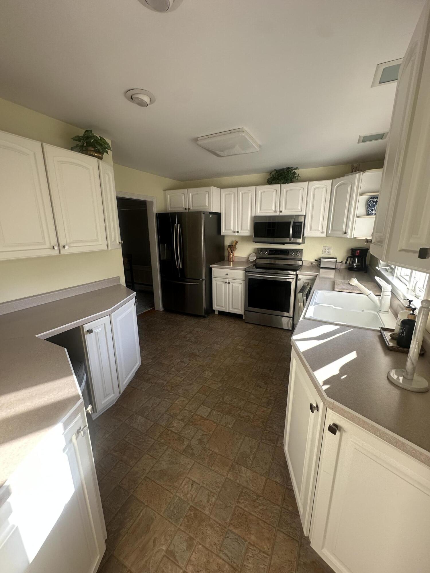 73 Forest Avenue Millinocket, ME 04462 - Photo 4 of 21 3B099935-2F39-4FB5-8D4D-B659D3469C94