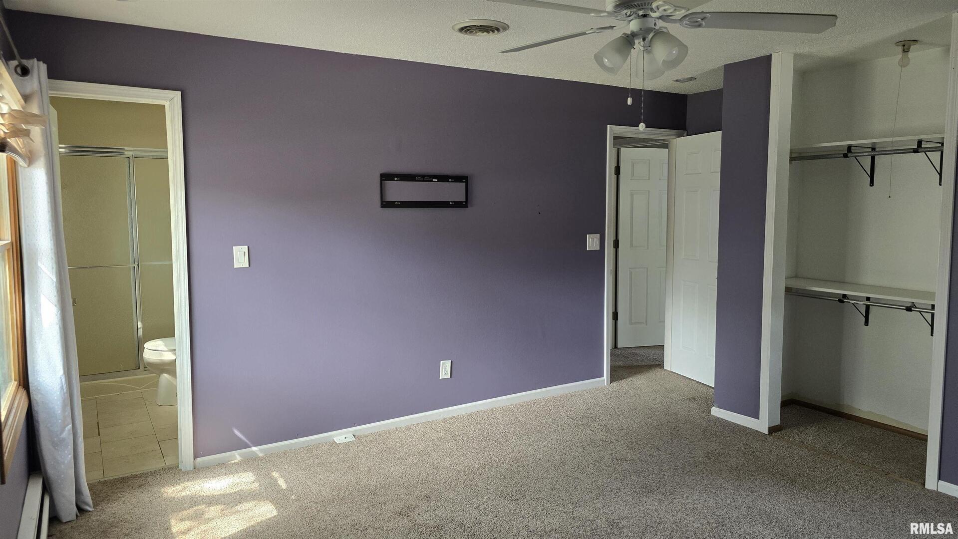 601 Scenic Drive Clinton, IA 52732 - Photo 8 of 16 a view of a livingroom with a chandelier