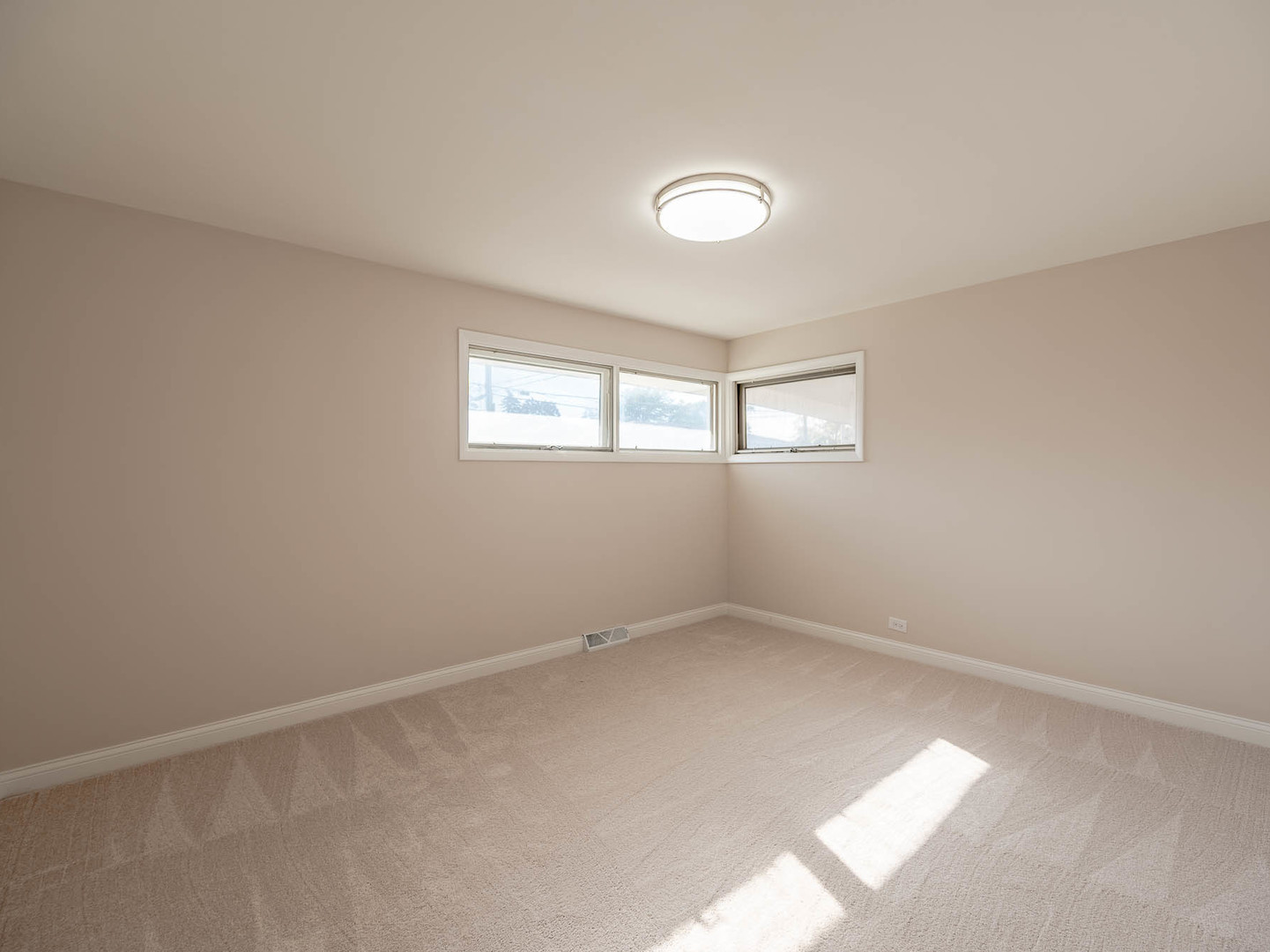 1502 35th Avenue Melrose Park, IL 60160 - Photo 6 of 11 an empty room with windows