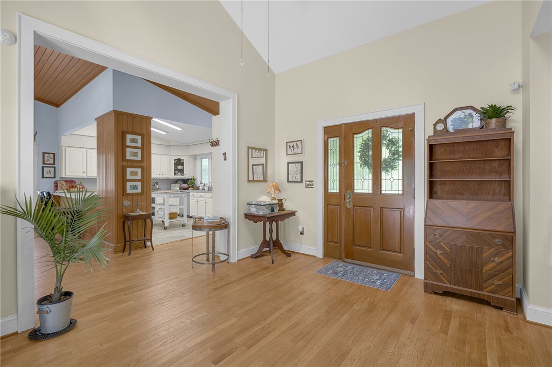 218 Northridge Drive Anderson, SC 29621 - Photo 5 of 50 A warm, inviting entryway features gleaming hardwood floors and a striking front door with leaded glass.