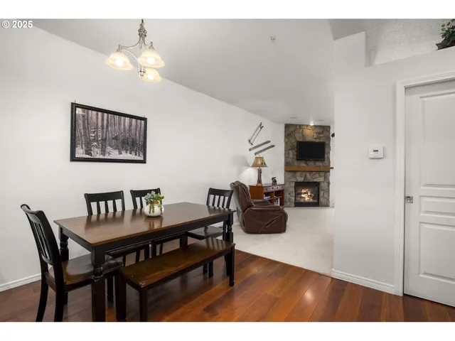 a view of kitchen with cabinets and wooden floor