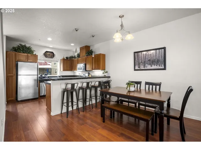 a bathroom with a sink vanity and mirror