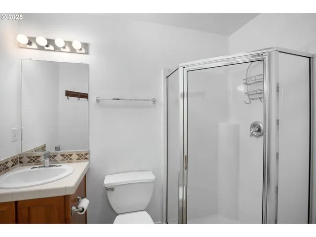 a view of a hallway with a white house