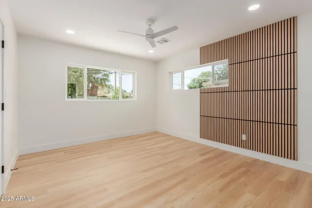 en empty room with windows