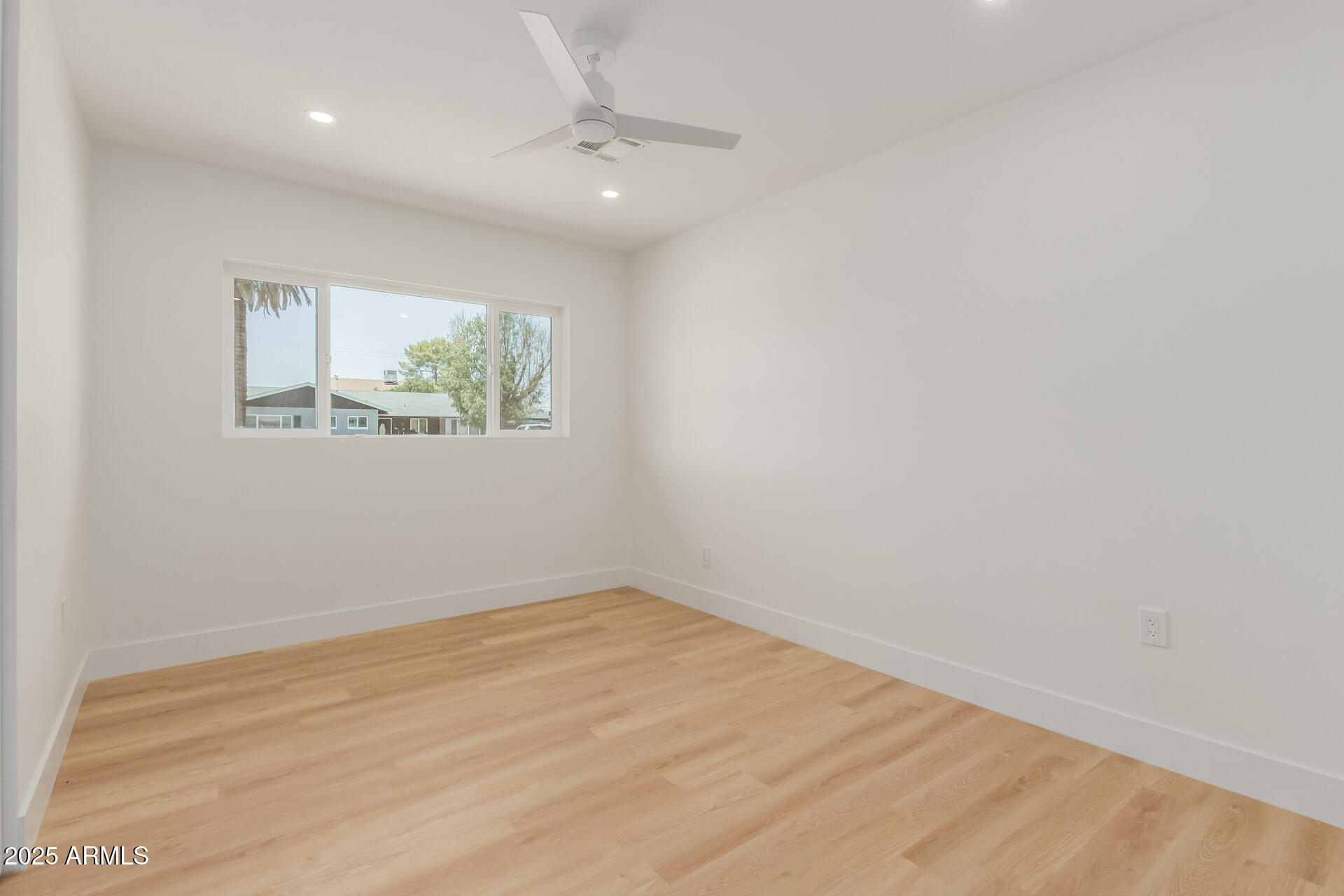 1311 East 2nd Place Mesa, AZ 85203 - Photo 17 of 29 an empty room with windows