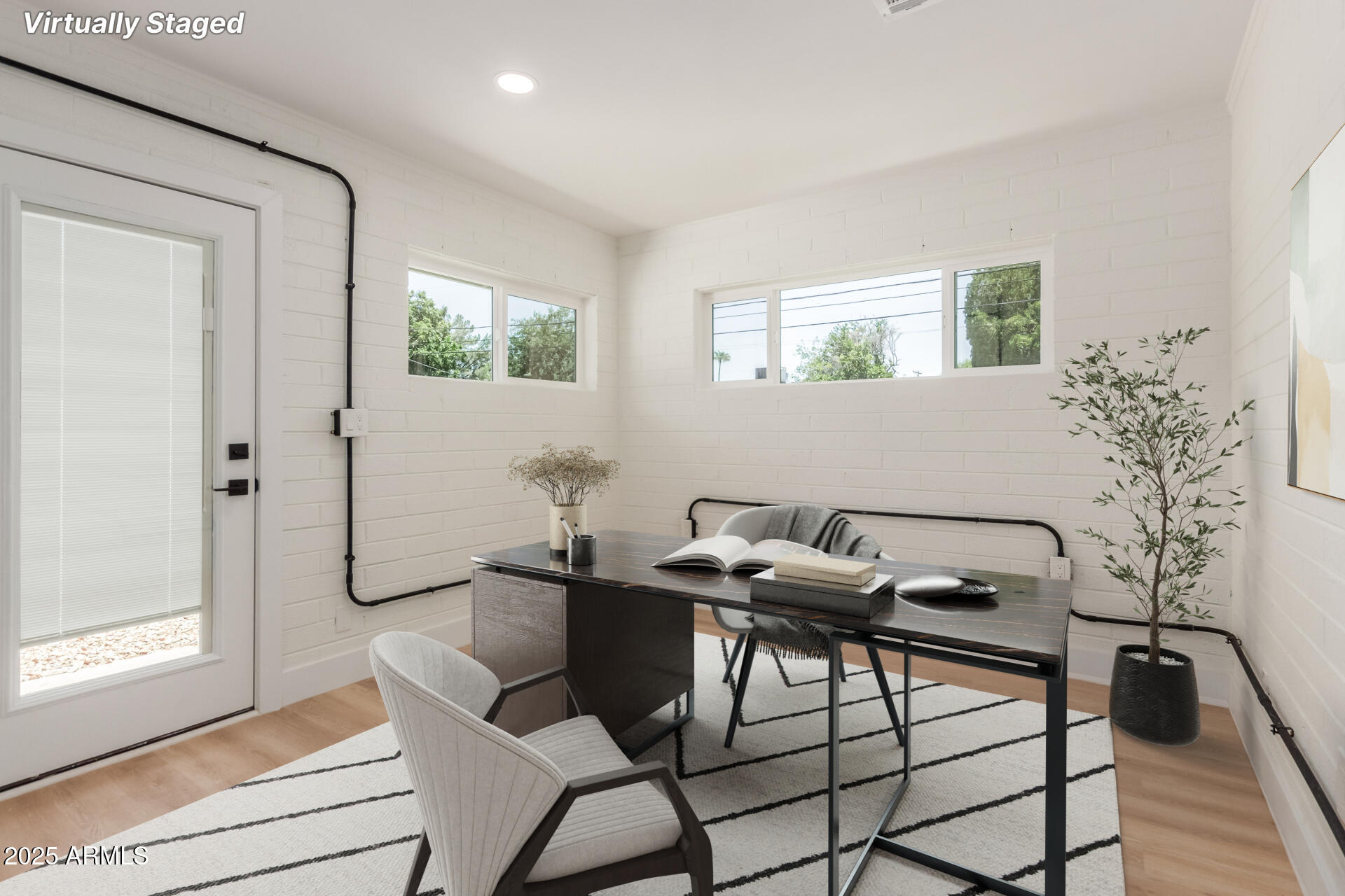 1311 East 2nd Place Mesa, AZ 85203 - Photo 24 of 29 a view of a dining room with furniture and wooden floor