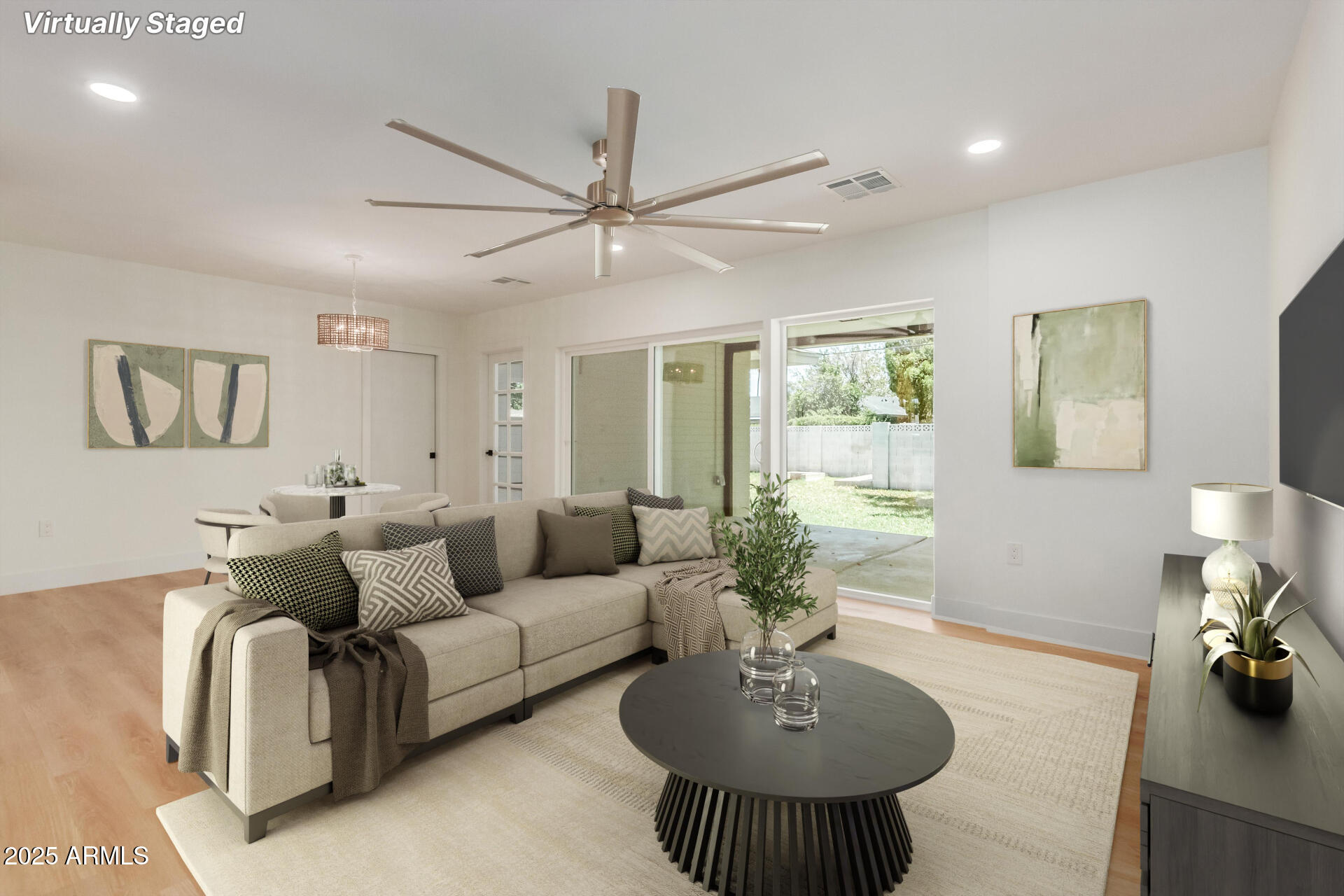 1311 East 2nd Place Mesa, AZ 85203 - Photo 3 of 29 a living room with furniture and a wooden floor
