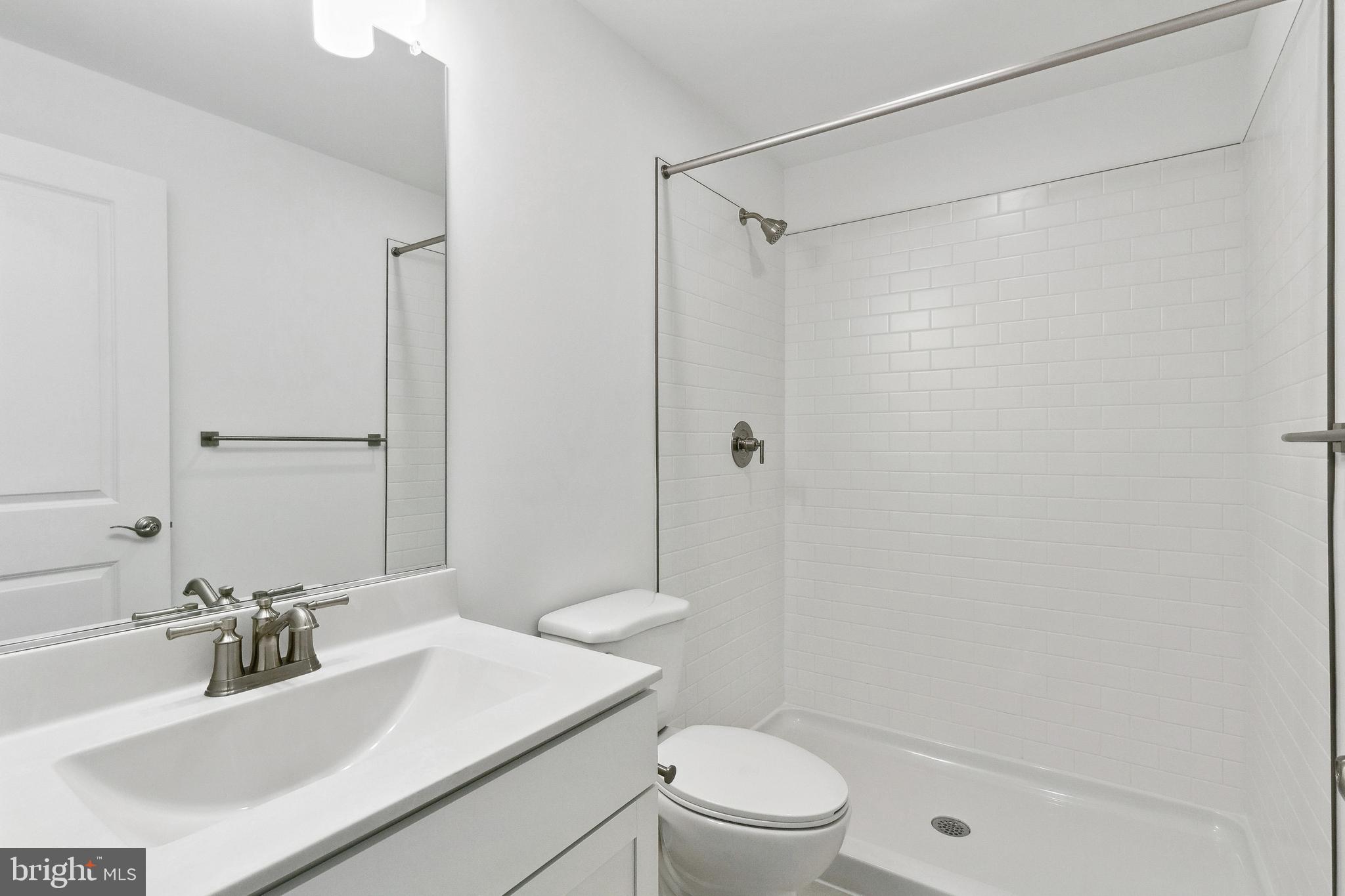 128 Patterson Court Middletown, DE 19709 - Photo 22 of 31 a bathroom with a sink toilet and shower