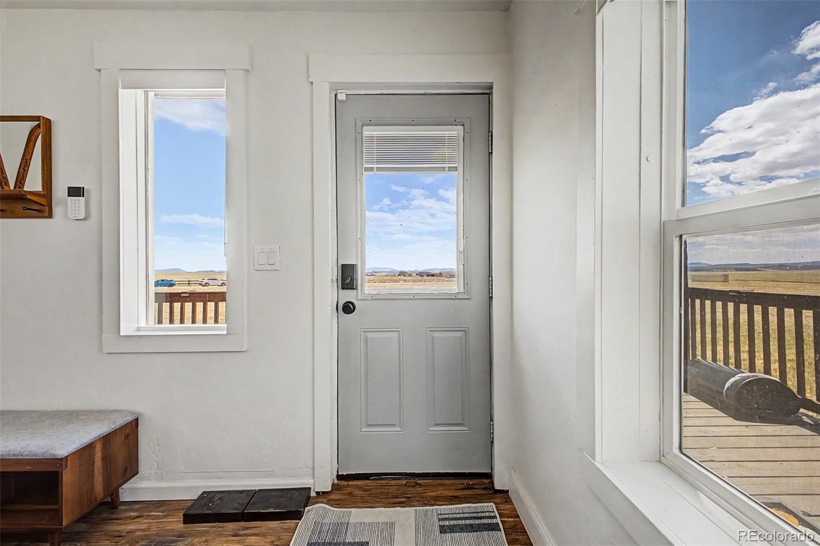 1365 Kokanee Road Fairplay, CO 80440 - Photo 5 of 45 a view of an entryway with wooden floor