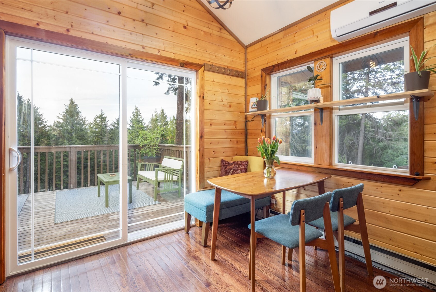 451 Aspen Springs Road Cle Elum, WA 98922 - Photo 5 of 31 a view of a dining room with furniture wooden floor and next to a window