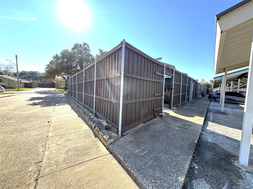 9461 Timberleaf Drive Dallas, TX 75243 - Photo 31 of 32 a view of a backyard with swimming pool