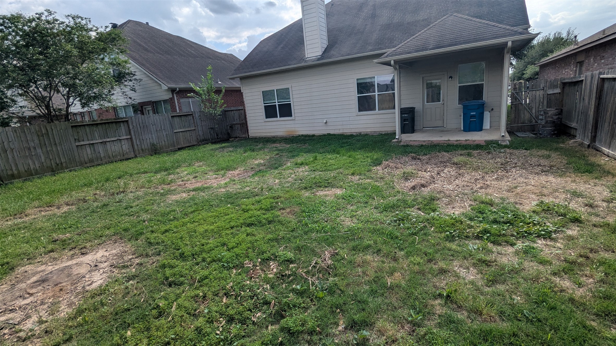 21850 Catoosa Drive Spring, TX 77388 - Photo 15 of 15 a view of a house with a yard