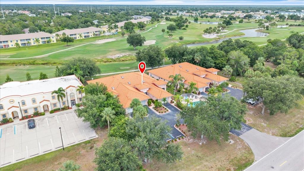 1260 Rio De Janeiro Avenue, Unit 102 Punta Gorda, FL 33983 - Photo 39 of 46 an aerial view of a house