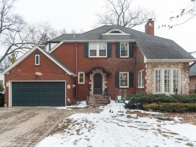 749 Elmore Street Park Ridge, IL 60068 - Photo 1 of 10 a front view of a house with a yard