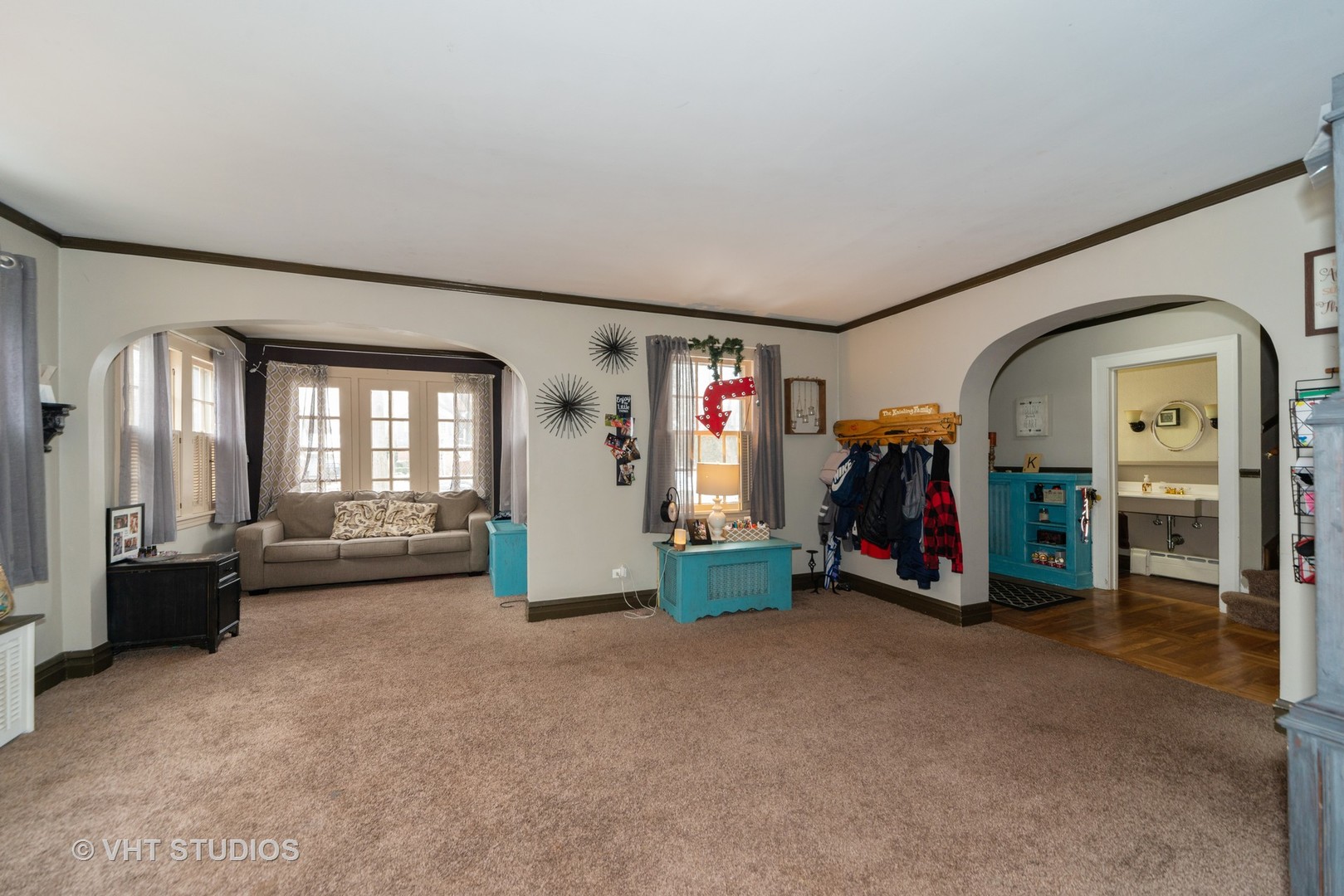749 Elmore Street Park Ridge, IL 60068 - Photo 3 of 10 a view of a livingroom with furniture and a ceiling fan