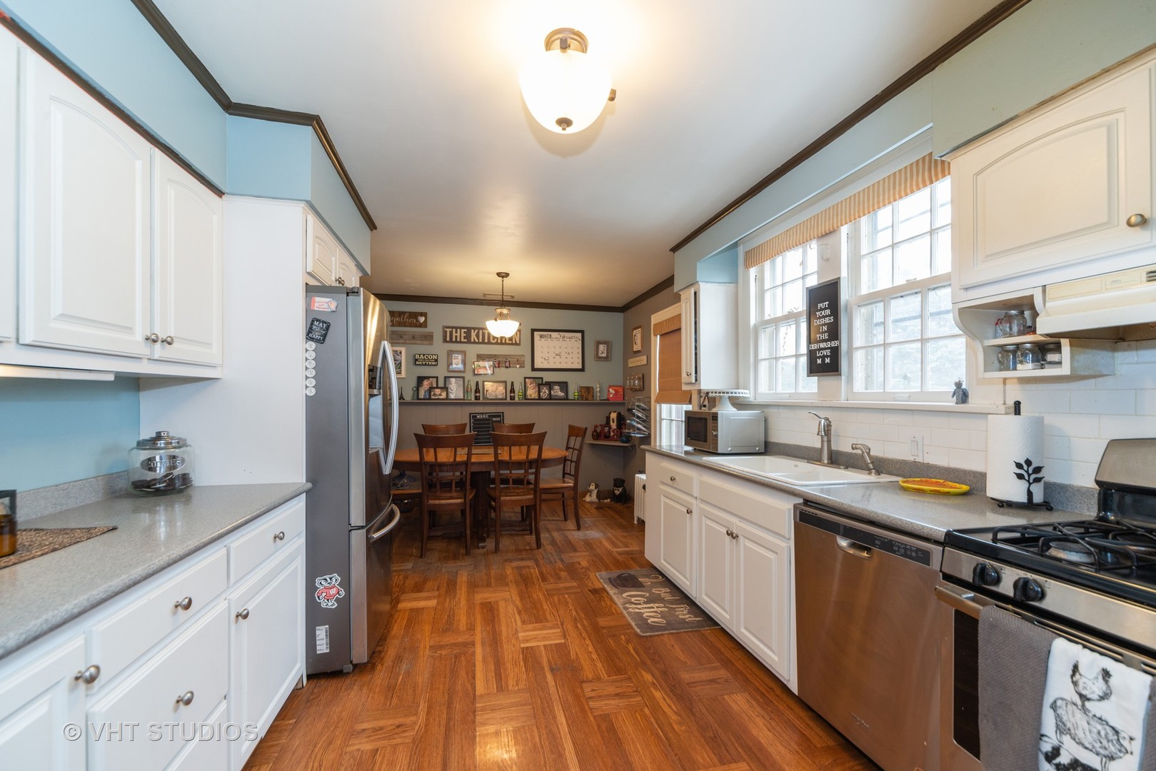 749 Elmore Street Park Ridge, IL 60068 - Photo 5 of 10 a kitchen with stainless steel appliances a stove a sink and a refrigerator